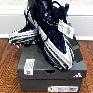 Adidas kids football cleats size 5 1/2.